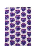 Load image into Gallery viewer, Pansy tea towel out flat showing repeating design on white background across the whole towel
