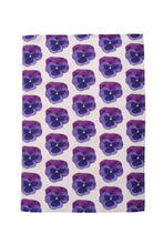 Load image into Gallery viewer, Pansy tea towel out flat showing repeating design on white background across the whole towel