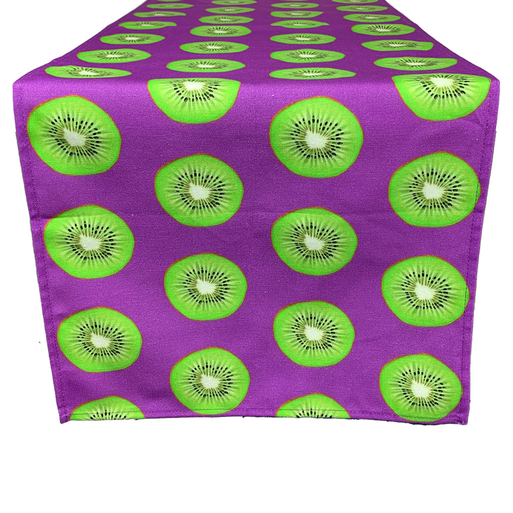 Kiwi table runner with a bright purple background to the design.